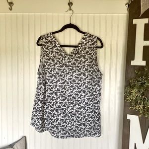Black and white sleeveless blouse